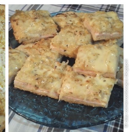 Fugazza rellena de jamón y queso cubierta con cebolla y mozzarella (/5)